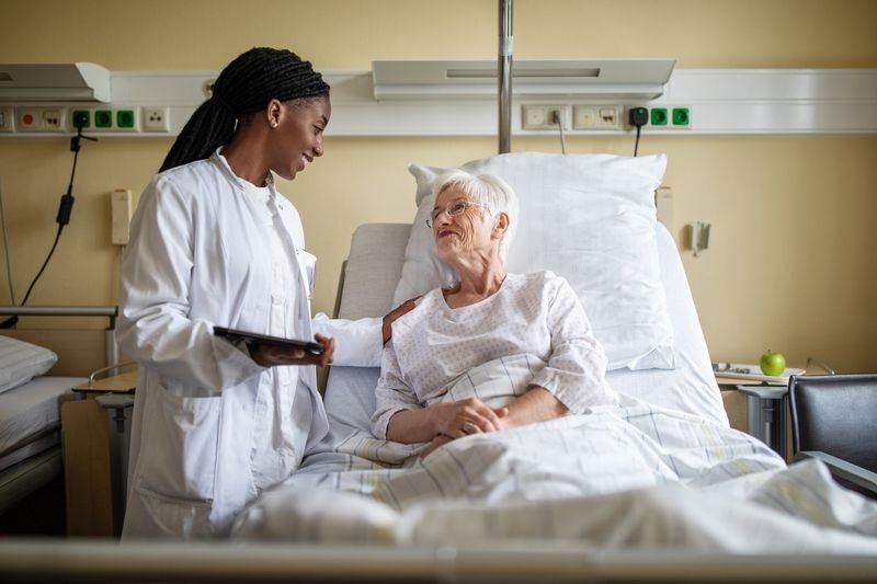 Nurse caring for a patient